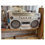 Carport Wall (Purchaser must remove)-Cast Iron Skillet/ Old bucket/Meat Grinder/Boom Box/Misc.- CPW1