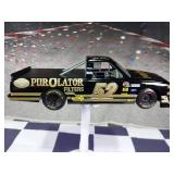 (UNUSED) Mike Wallace #52 NASCAR Racing Champions PurOlator Filters 1:24 Scale Diecast Truck