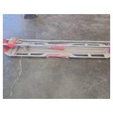 Set of Two Tile Cutters and Folding Base for Equipment.