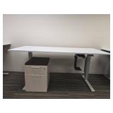 Humanscale Height-Adjustable Desk with Cushioned File Cabinet