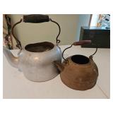 One aluminum tea kettle, one could be copper