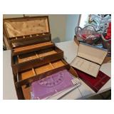 One large jewelry box, too small jewelry holders, and beading board