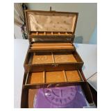 One large jewelry box, too small jewelry holders, and beading board