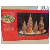 Four, figural holiday candles with snow and ceramic tray
