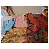 Two ladies size small shirts, one very thin over shirt, leather trimmed vest