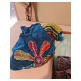 Four, ladies size medium sweaters