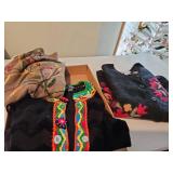 Three, lady size large fancy trimmed sweaters