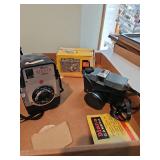 Brownie Bullseye camera, and a Diana camera m