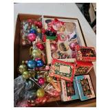 Vintage Christmas ornaments, small plastic Santa on a sled, miniature Christmas ornaments