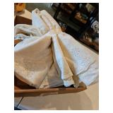 Two, lace tablecloths