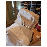 Two, lace tablecloths
