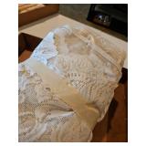 Two, lace tablecloths