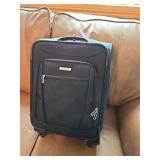 Small rolling Samsonite suitcase
