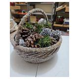 Glitter and beaded basket with pine cones approximately 10 in tall and 11 inches across