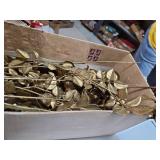 Box of gold plastic roses