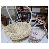 Two decorative white wicker baskets
