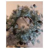 Approximate 20-in wreath with glitter and pine cones