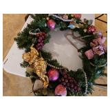 Approximately 30 in wreath with fruit and Angel