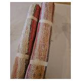 Two small woven area rugs