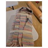 Approximately 5x8 woven area rug