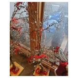 Twig Christmas tree decorated with crystals and red bows