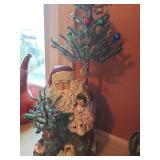 14 inch tall resin Santa with Christmas tree