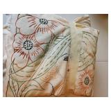 Two, small embroidered pillows