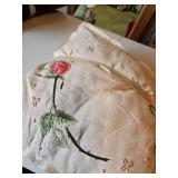 Two, small embroidered pillows