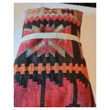 Two, woven Southwest themed pillows