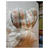 Three small decorative pillows