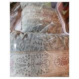 Four decorative pillows