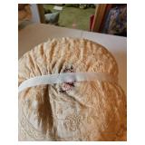 Pink and blue lace covered pillows