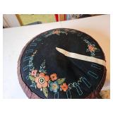Round embroidered pillow