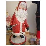 Carved wood Santa with teddy bear