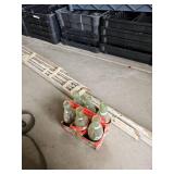 Six pack of old Coke bottles and miscellaneous pieces of old trim