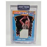 Jersey Fusion Larry Bird 1989 Fleer Sticker with Game Used Piece Celtics
