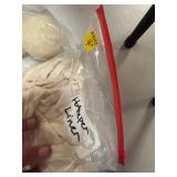 Assortment of laundry detergent and cleaning chemicals