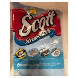 Assortment of laundry detergent and cleaning chemicals