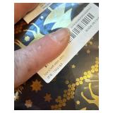Six pieces of gold and black foil wrapping paper, two designs.