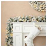 $46 2pk 6ft Pre-Lit Snow Flocked Christmas Garlands, 35 LED Lights