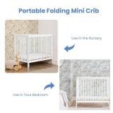 Delta Children Mia Portable Folding Mini Crib with 1.5-Inch Mattress - Greenguard Gold Certified, Bianca White