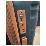 Romtour black small suitcase approximately 18x13 in and 360 spin -