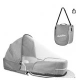 Portable baby bed foldable into a bag -