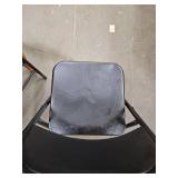 2 black folding chairs