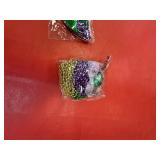 MArdi gras masquesrade masks and beads with coins