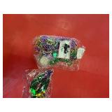 MArdi gras masquesrade masks and beads with coins