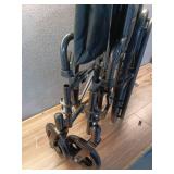 Medline Comfortable Folding Wheelchair with Swing-Back Desk-Length Arms and Swing-Away Footrests, 20W x 16D Seat - Retail: $150