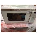 Hamilton Beach 1.1 Cu ft Countertop Microwave Oven  White and Stainless Steel