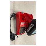 M18 18-Volt Lithium-Ion High Output Battery 6.0Ah with M12 and M18 12-Volt/18-Volt Lithium-Ion Multi-Voltage Battery Charger Retail: $290