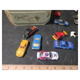 Collection of NASCAR Diecast Racing Cars with Cadbury Tin